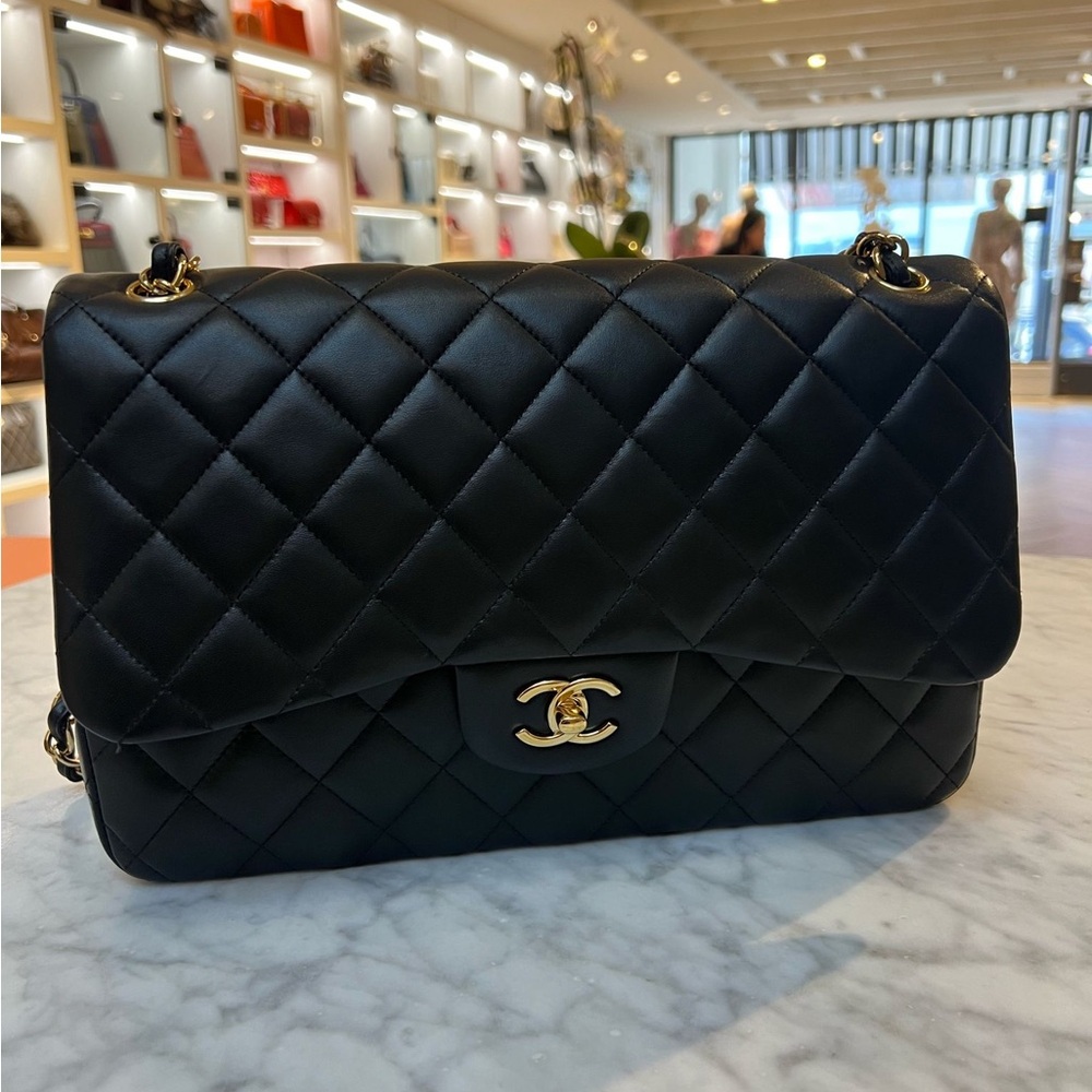 CHANEL™ BLACK LAMBSKIN LEATHER DOUBLE FLAP JUMBO BAG